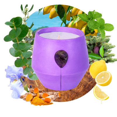 Image of Luna Iris candle with its scent collage at the back - the text reads: Wander through our enchanting lemon grove where soft pine and eucalyptus meet captivating black spruce. This scent is invigorating uplifting and brings peace.  Elevate your tranquility with our Amethyst adorned vessel in a vibrant purple colour.