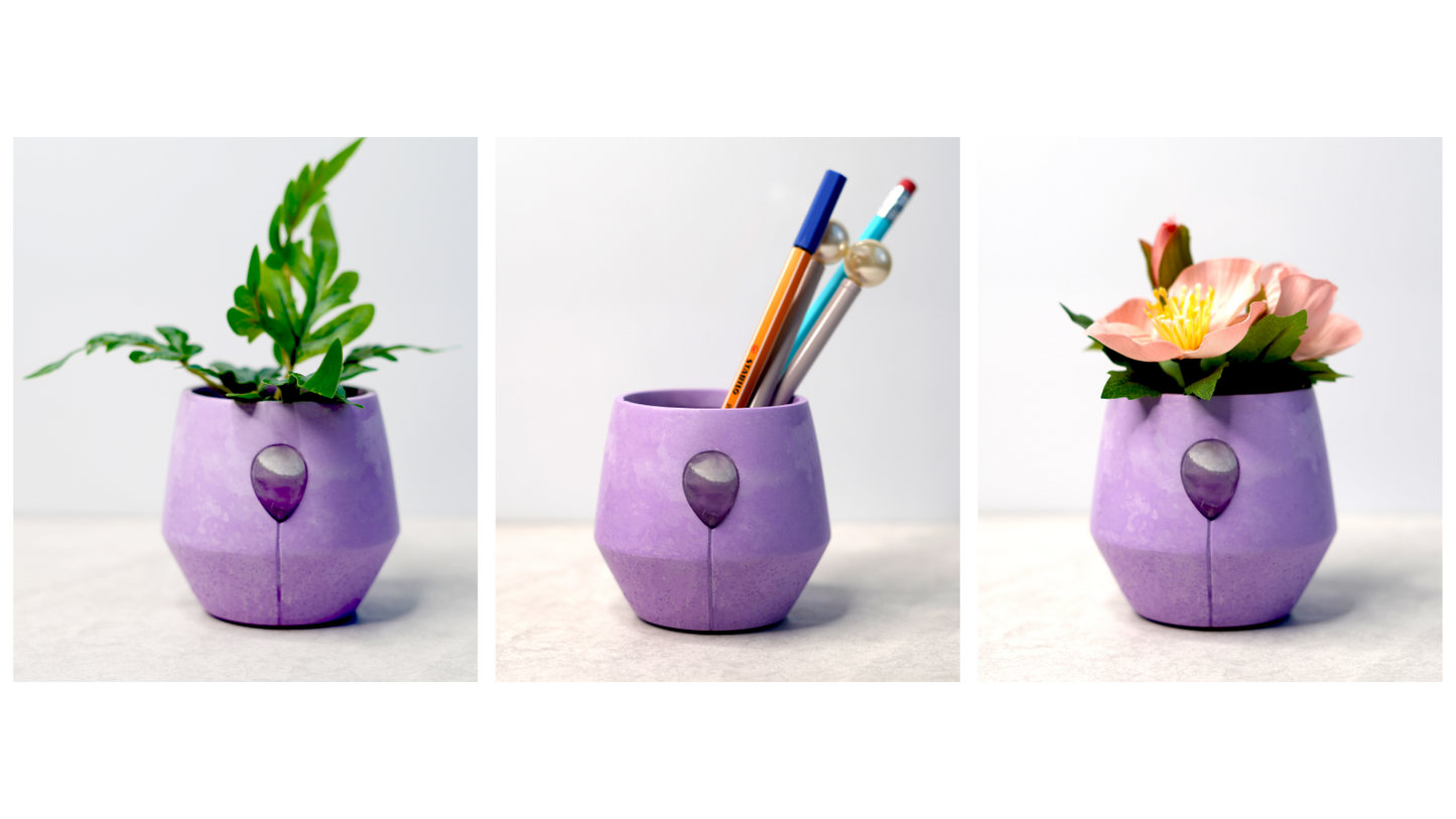 Luna Iris candle jar shown in 3 images, image one as a planter with a green leafy plant, image two as a pen pot and image three as a pot for a small succulent flower. 
